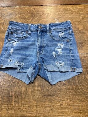 American Eagle high rise shortie Blue Distressed Denim Shorts sz 2